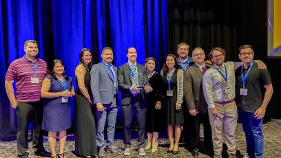 The group from Intel, CGCC, EMCC, and MCCCD accept the 2022 Governor’s Celebration of Innovation award for Innovator of the Year for Academia. 